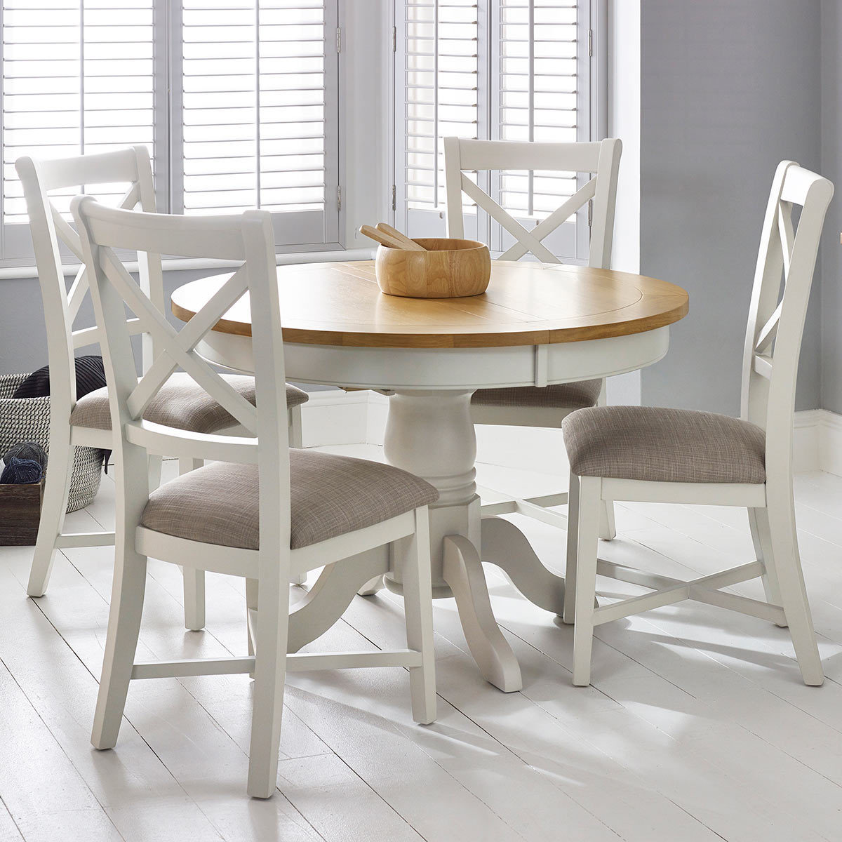 Use a round extendable dining table to save space in your dining room